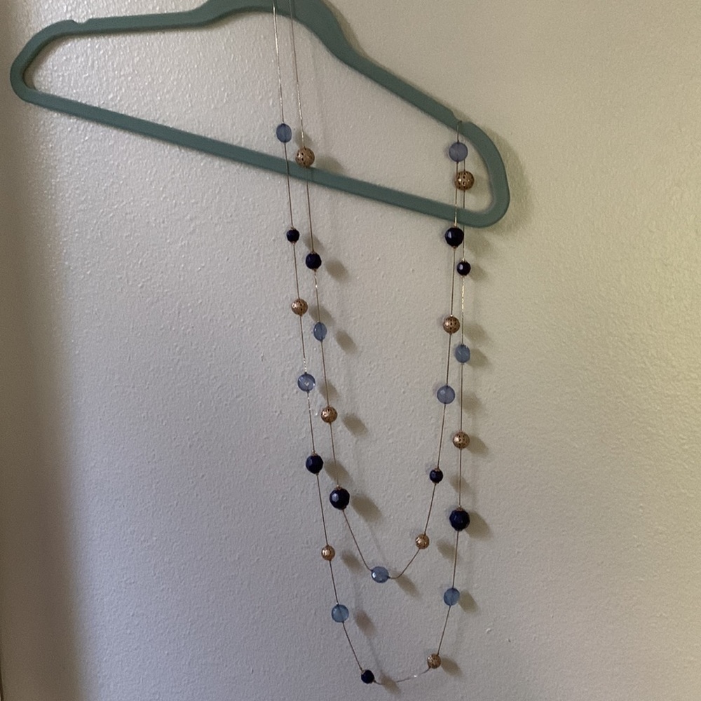 Premier, design, necklace, bracelet, and earrings.